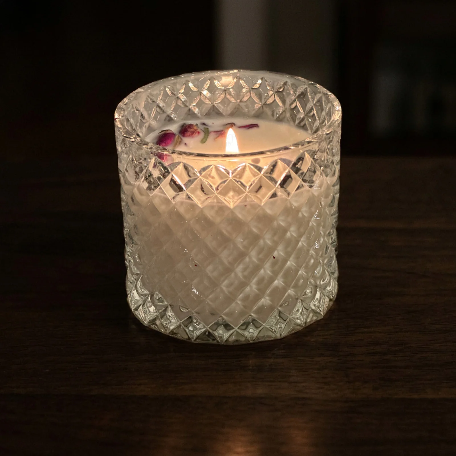 after: glass candle in warm low light
