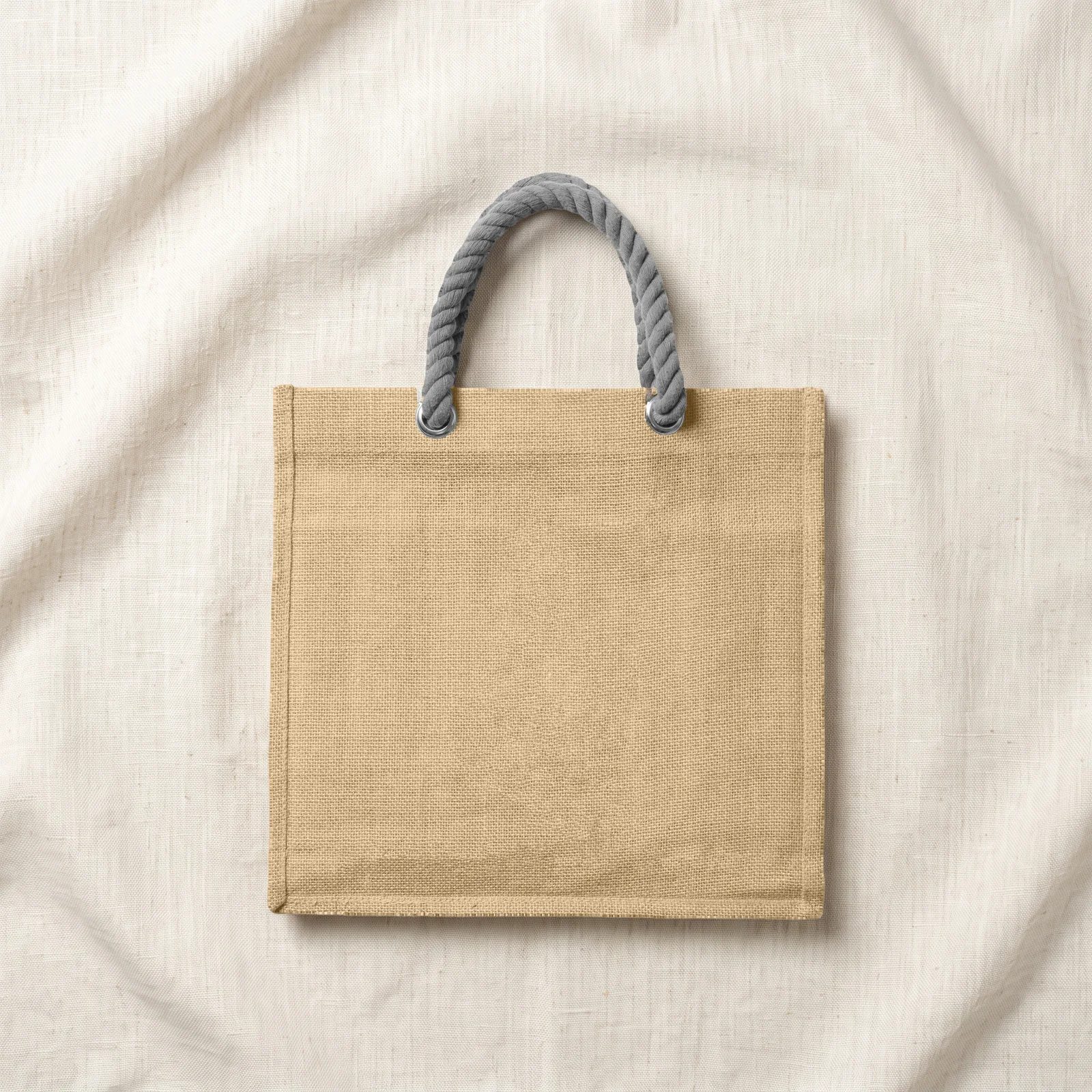 after: the same woven tote on softly lit linen