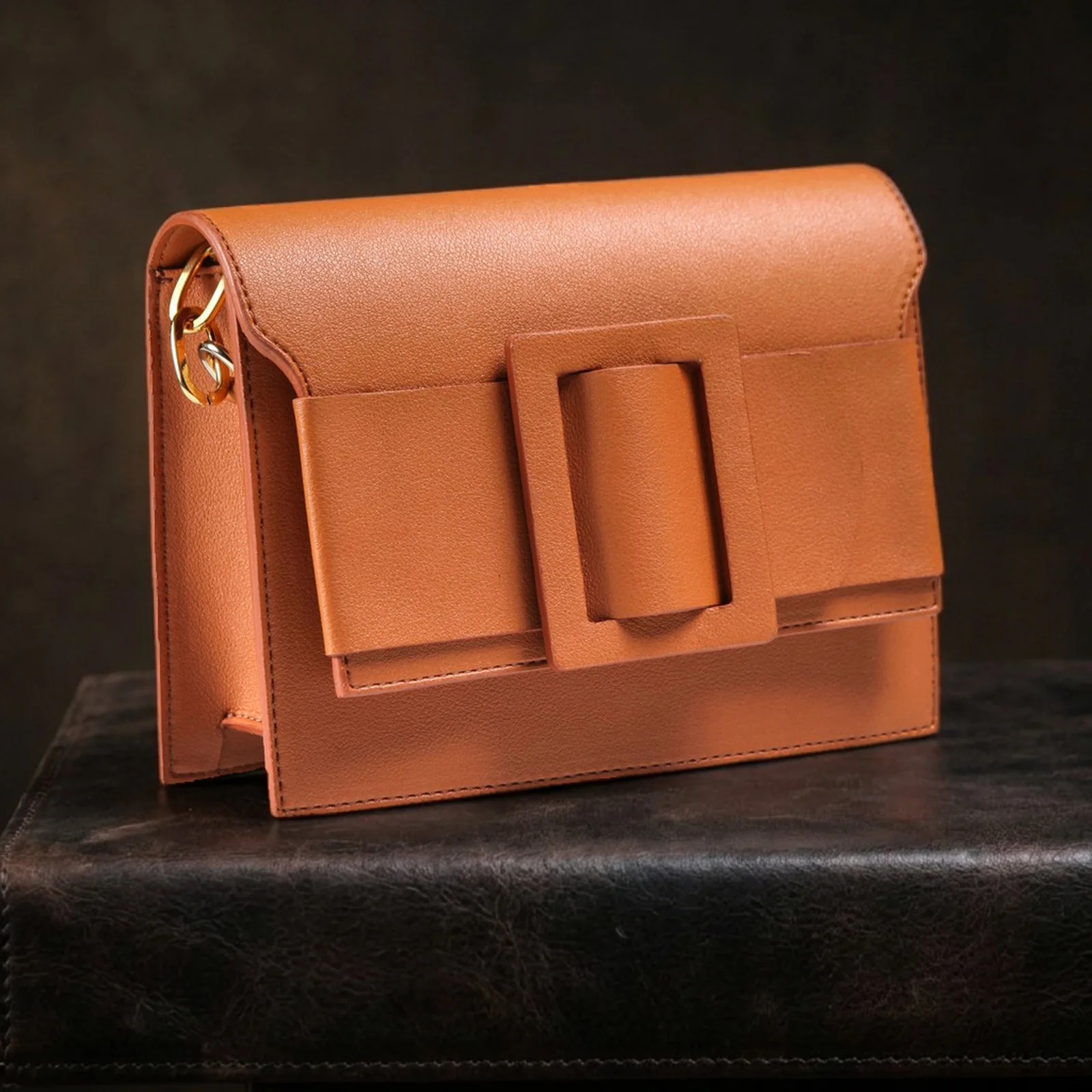 after: unbranded product in the dark leather scene preset